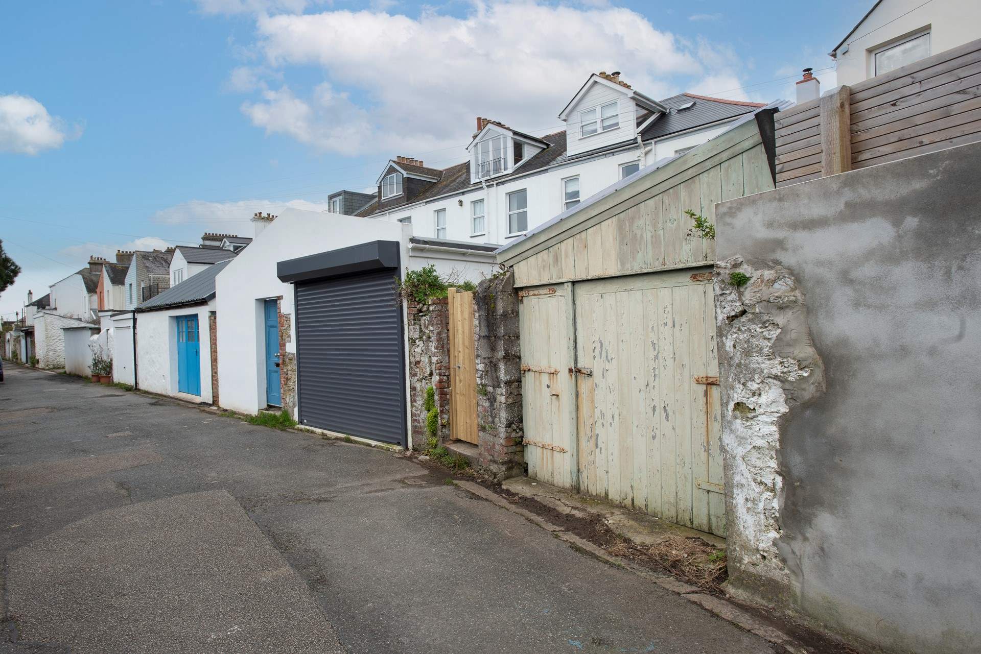 There is parking for one car on the access road behind the apartment. 