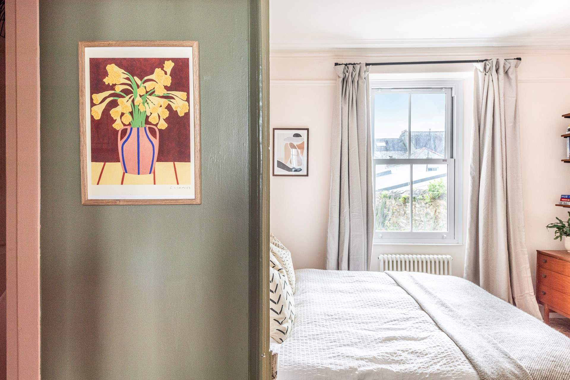 Peeking through the hallway into the bedroom. 