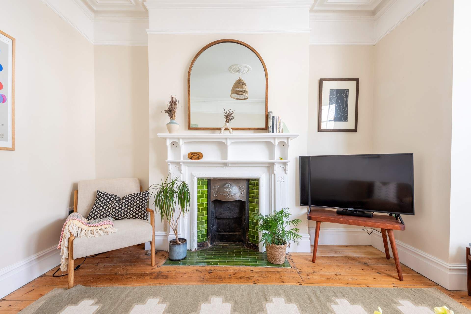 The beautiful original ornamental fireplace. 