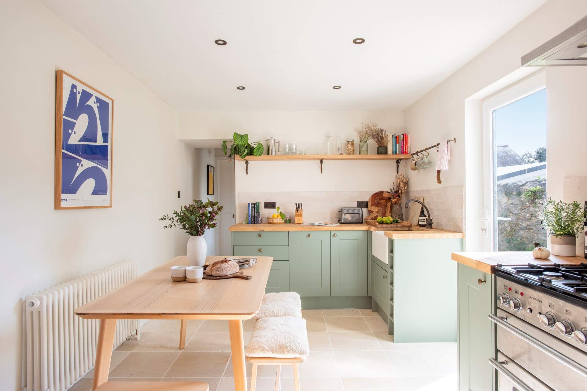 Step down into the modern farmhouse-style kitchen. 