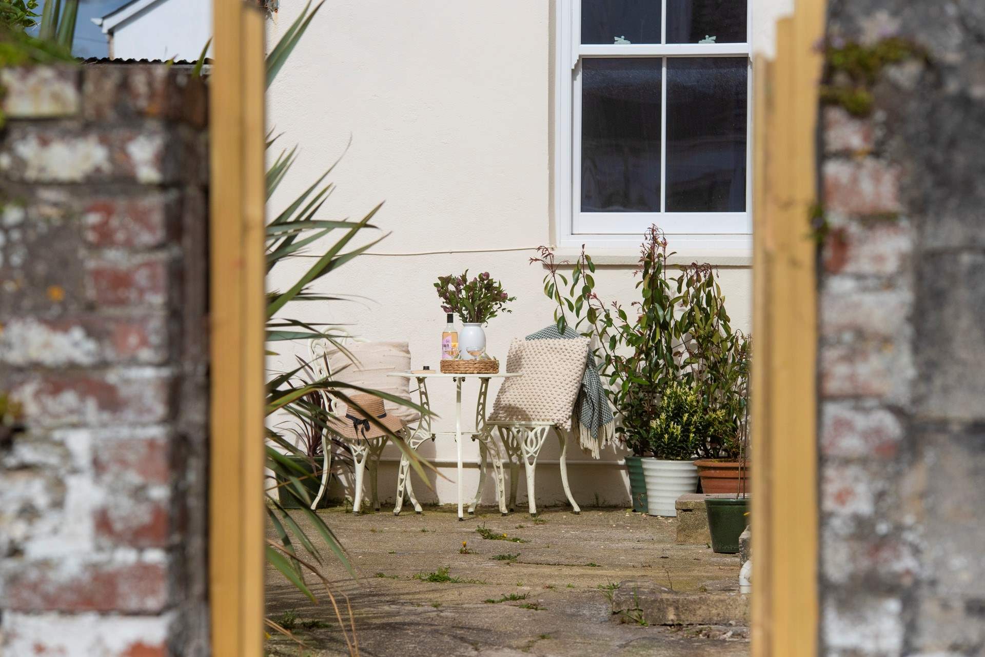 The sunny courtyard is found at the back of the apartment. 