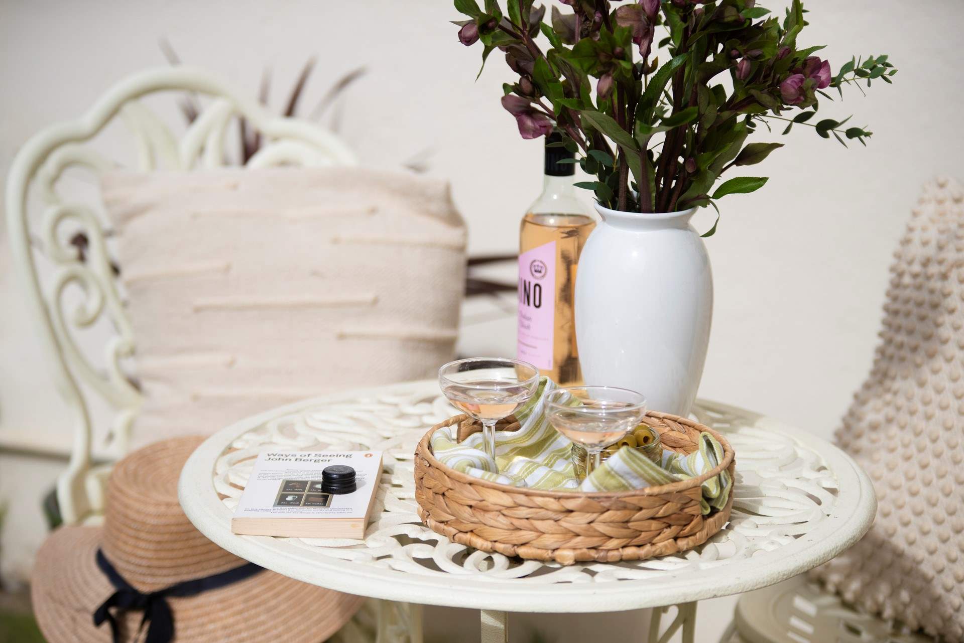 Enjoy a glass of wine in the sunny courtyard. 