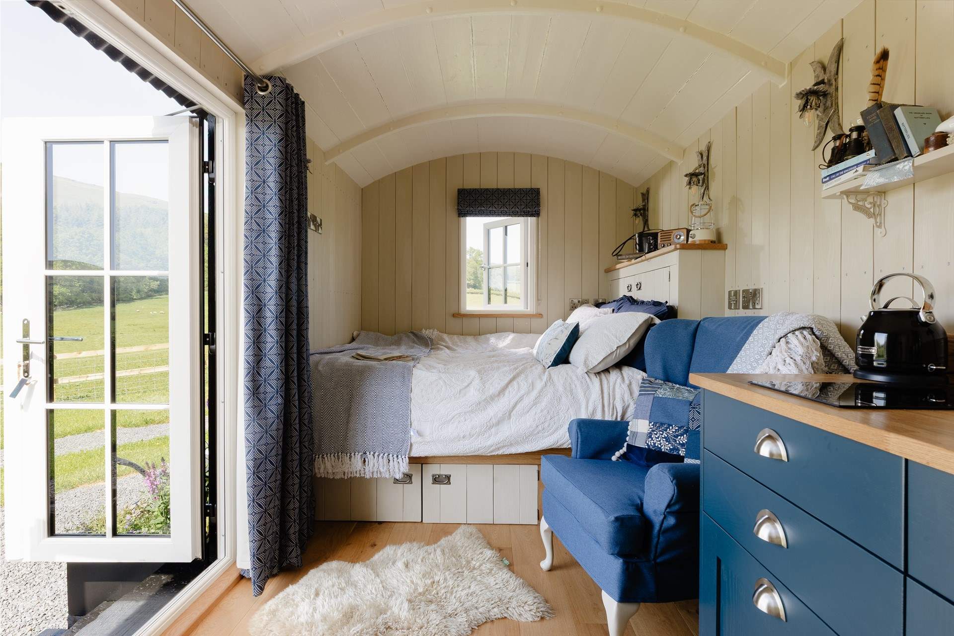 Set amongst the rolling landscapes of Powys, this beautifully converted railway wagon promises a peaceful escape in nature.