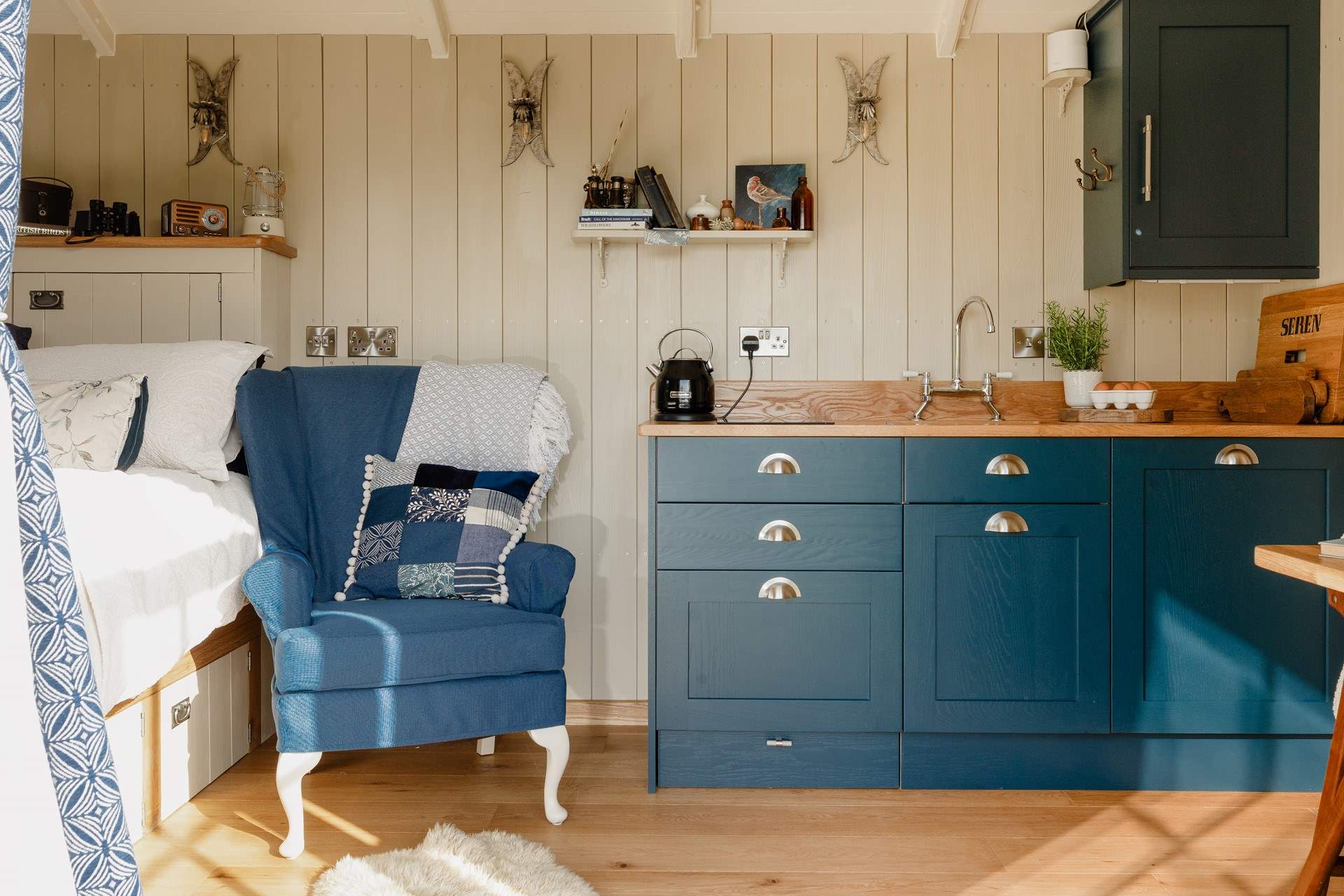 The gentle palette of blues creates a space that feels both cosy and calming.
