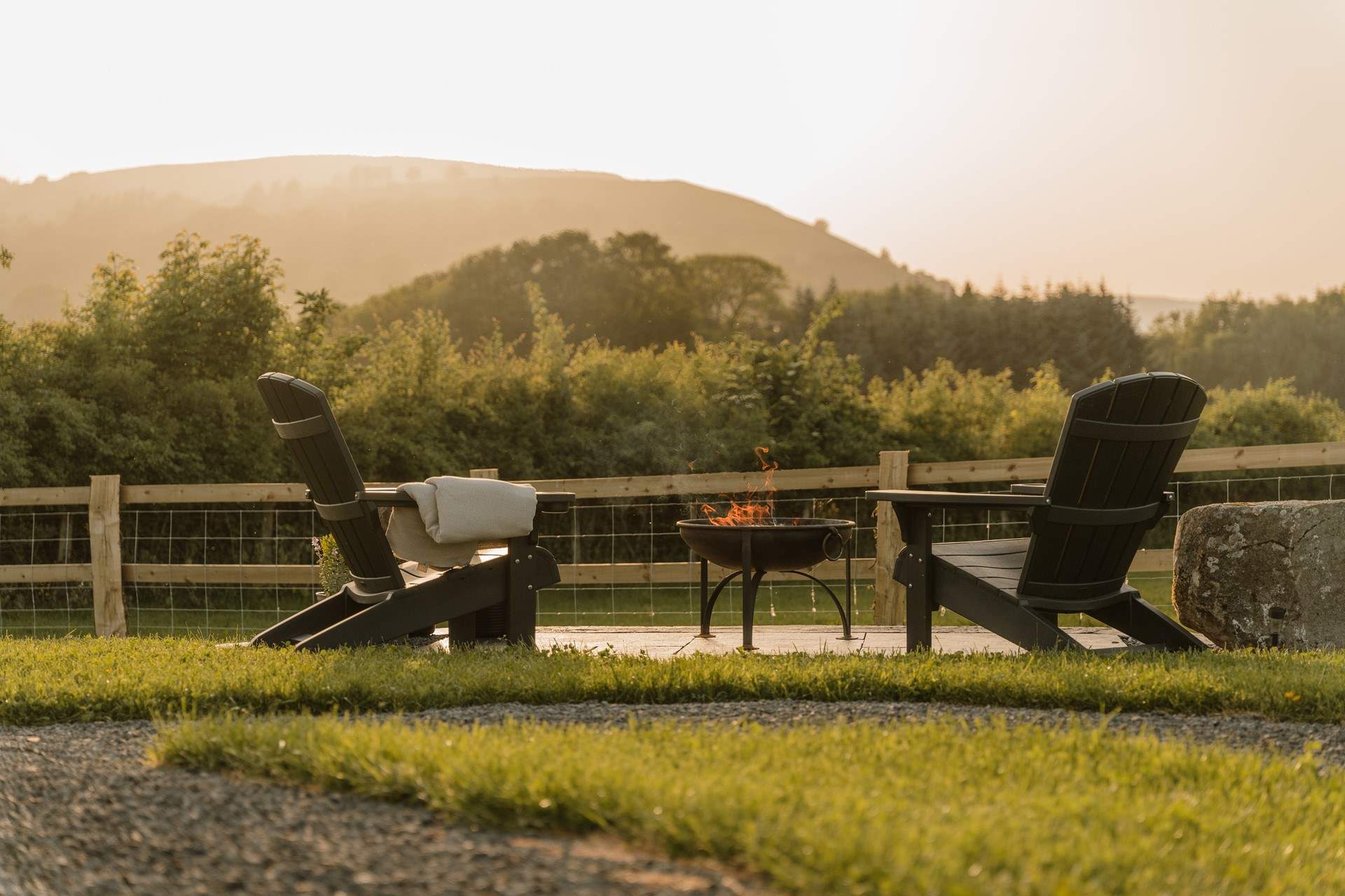 Spend leisurely afternoons reclining in the Adirondack loungers, toasting marshmallows over the fire pit as the sun sets.