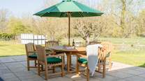Enjoy a good meal and conversation on the patio.