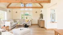 The vaulted ceiling and large windows make this room a gorgeous place to unwind after a day on the hills.