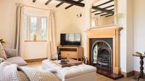 Cosy up in the snug and watch your favourite TV show.