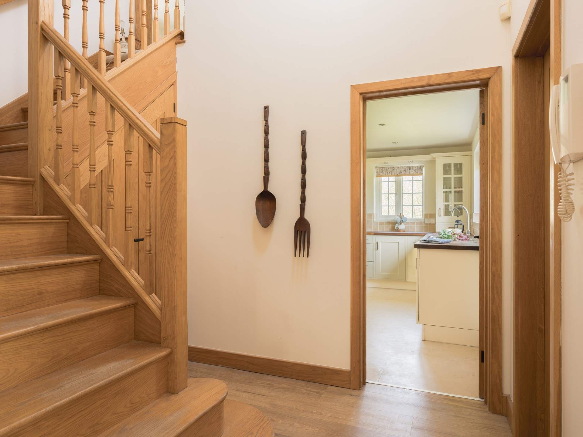 Admire the wooden staircase on the way through to the kitchen.