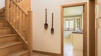 Admire the wooden staircase on the way through to the kitchen.