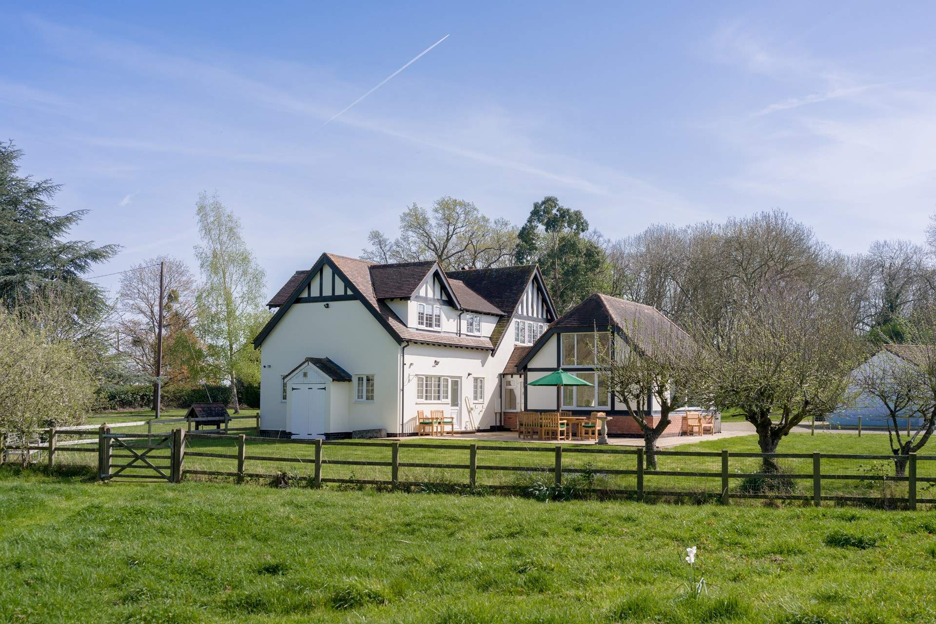 Welcome to The Woodlands, a spacious property nestled in two acres of garden.