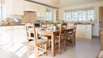 The dining kitchen is a great place for everyone to get together around the table.
