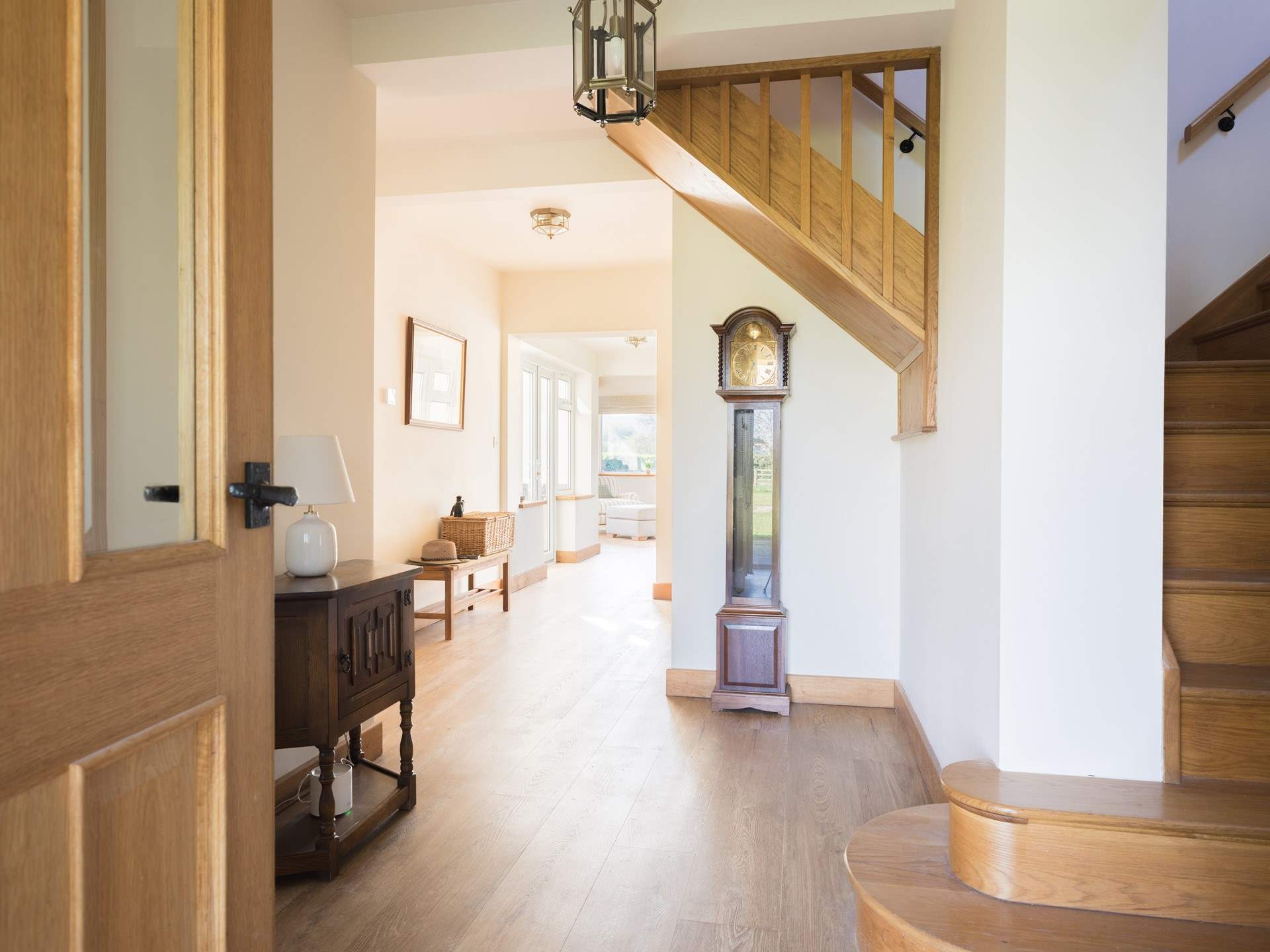 This spacious hallway lets the light flood in.
