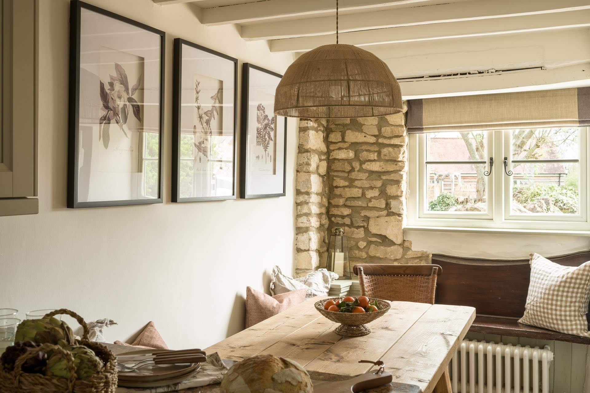 The original stone walls and beams give a nod to the age of this gorgeous cottage. 