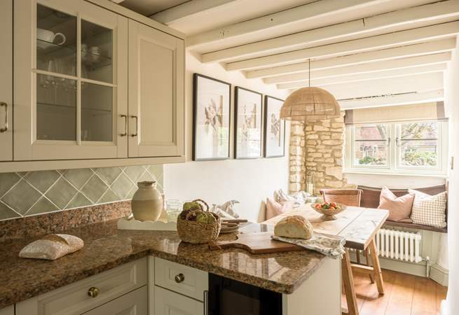 Just look at that beamed ceiling in the kitchen/dining-room.