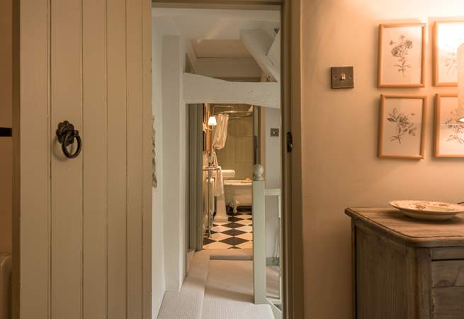 Just across the hallway is the stylish bathroom.