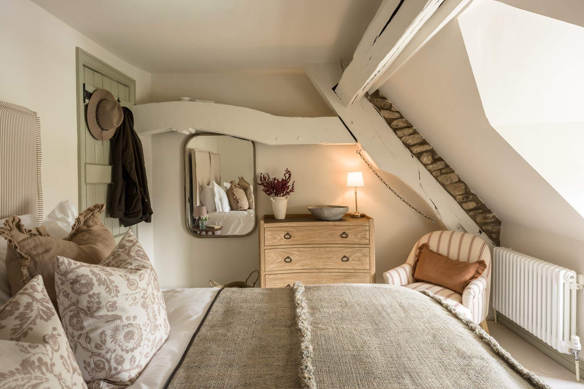Designer chic surrounds you in this beautiful super-king bedroom.