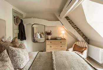 Designer chic surrounds you in this beautiful super-king bedroom.