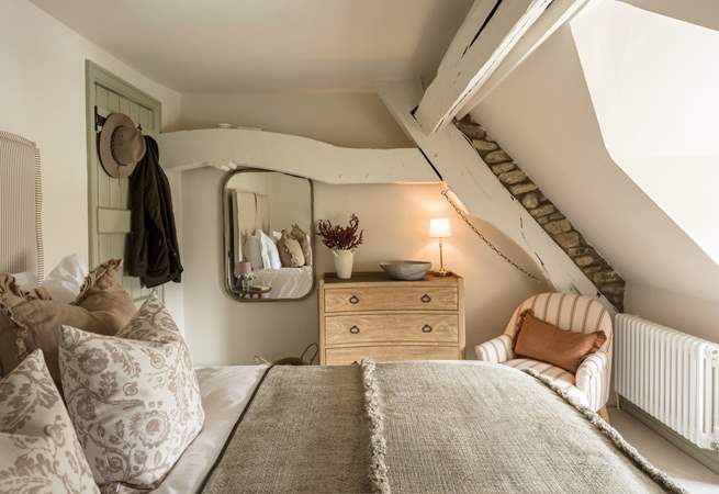Designer chic surrounds you in this beautiful super-king bedroom.