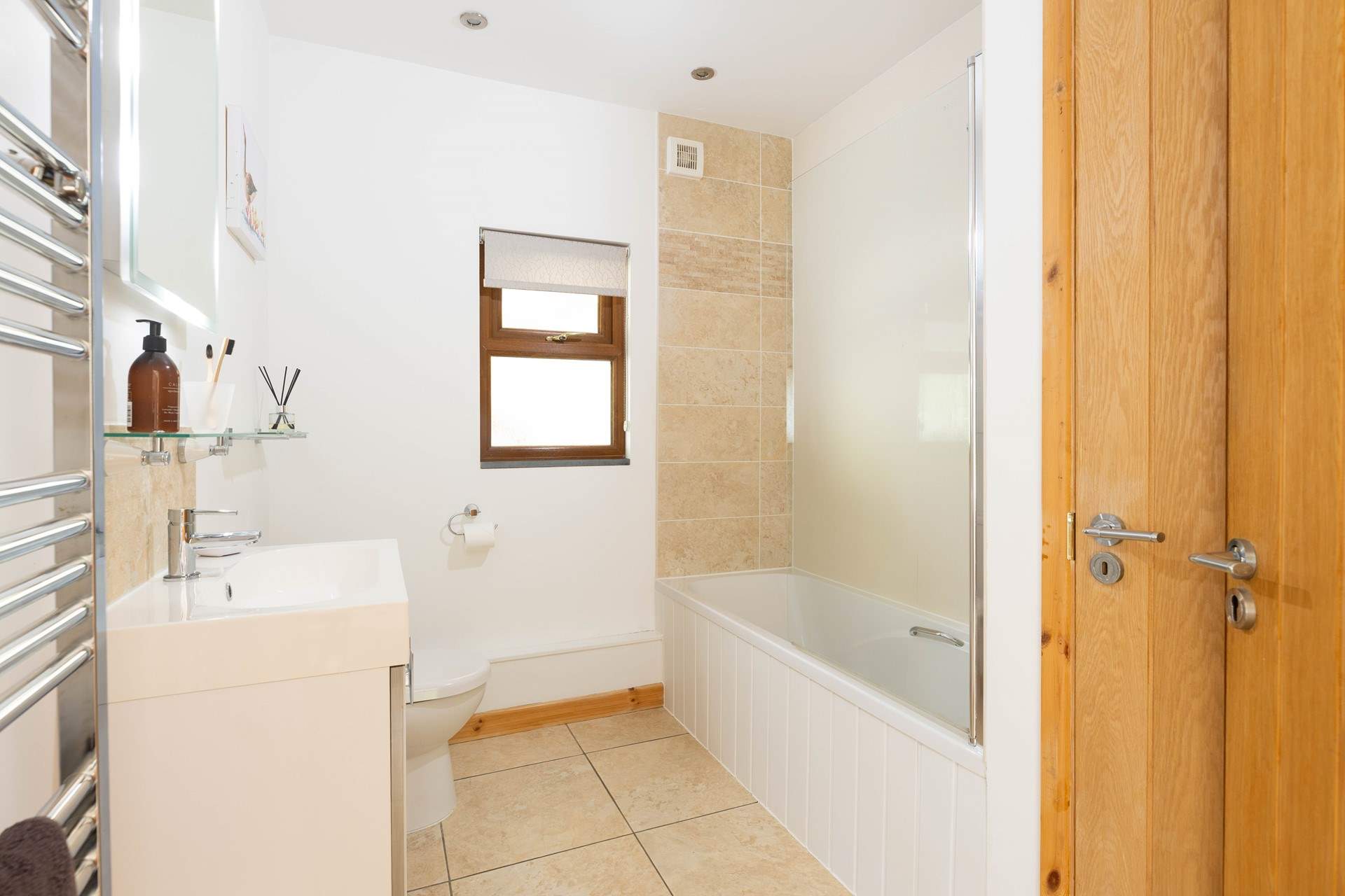 The bathroom on the ground floor - perfectly located for a soak after a day on the beach.