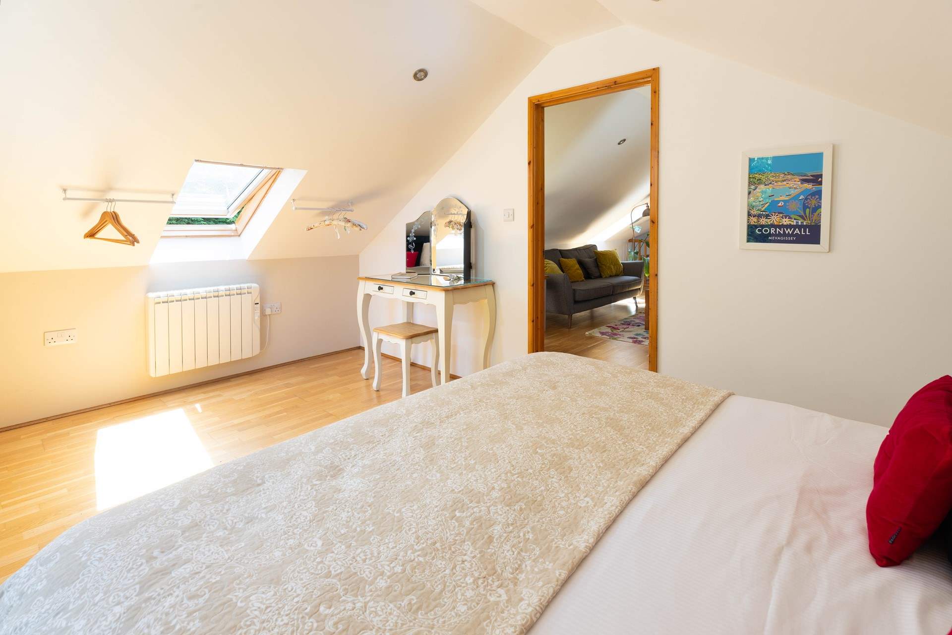 The bedroom is at the far end of the living space. 