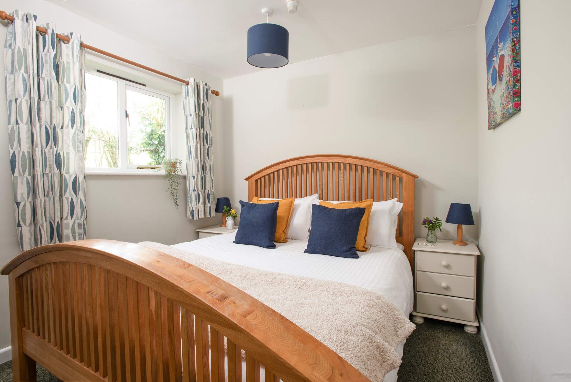 A king-size bed awaits in the bedroom.