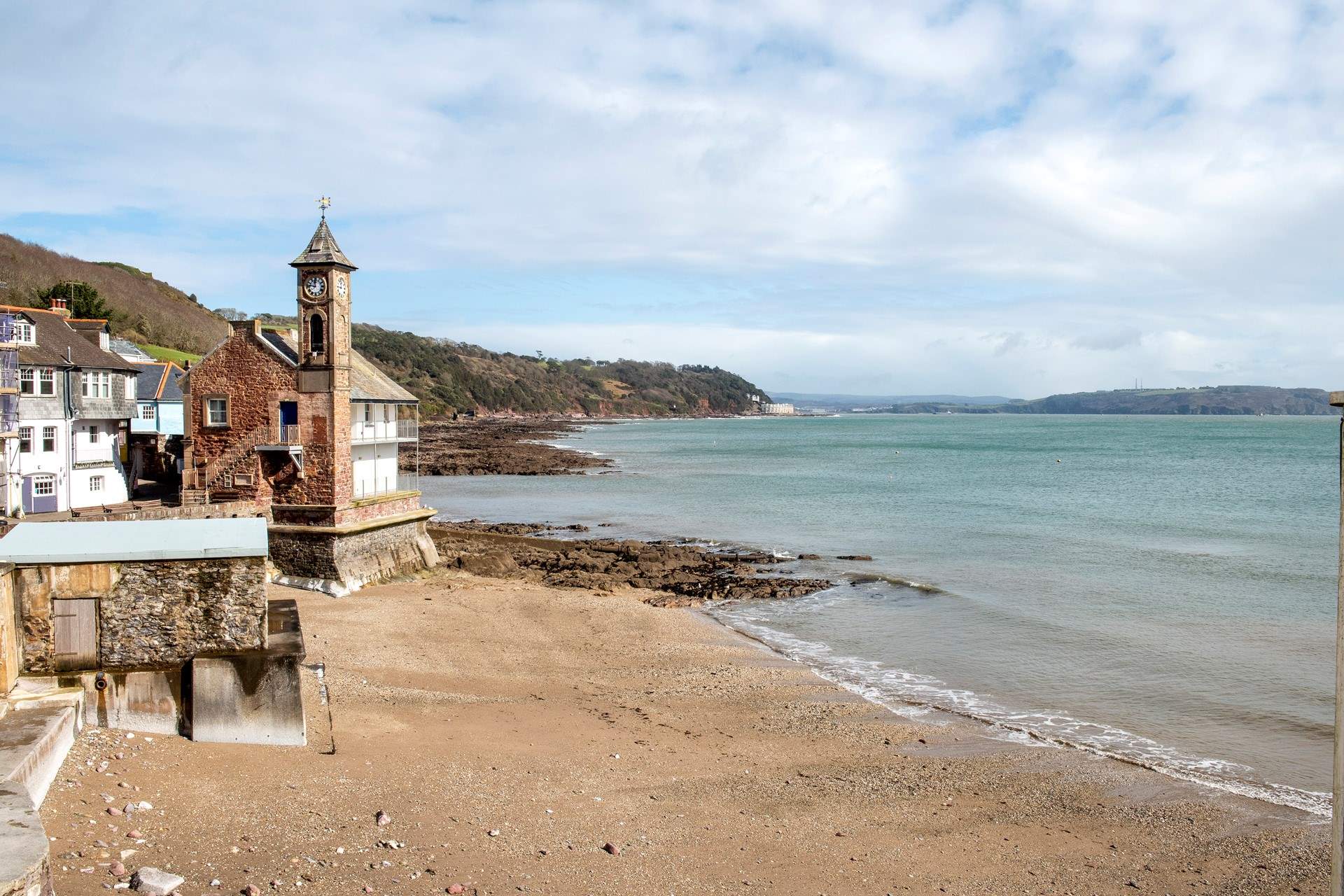 The iconic clock tower stands majestically on the beach.
