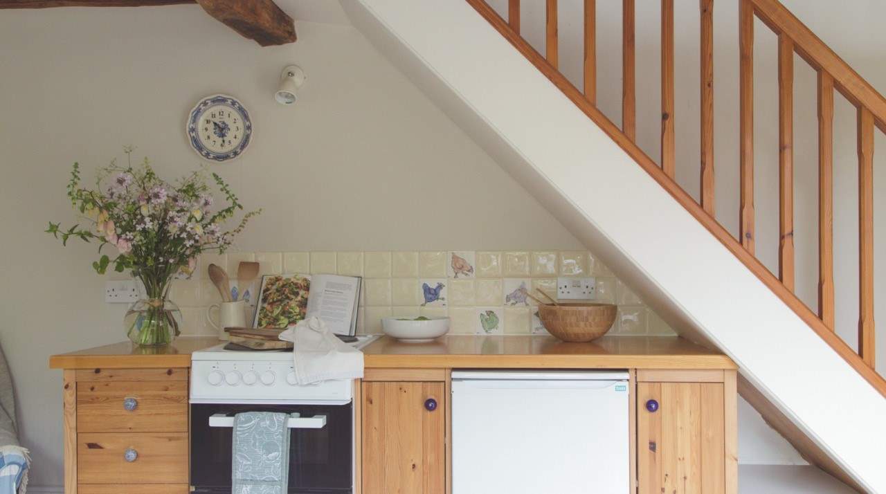 The kitchen is compact yet offers ample food preparation space.