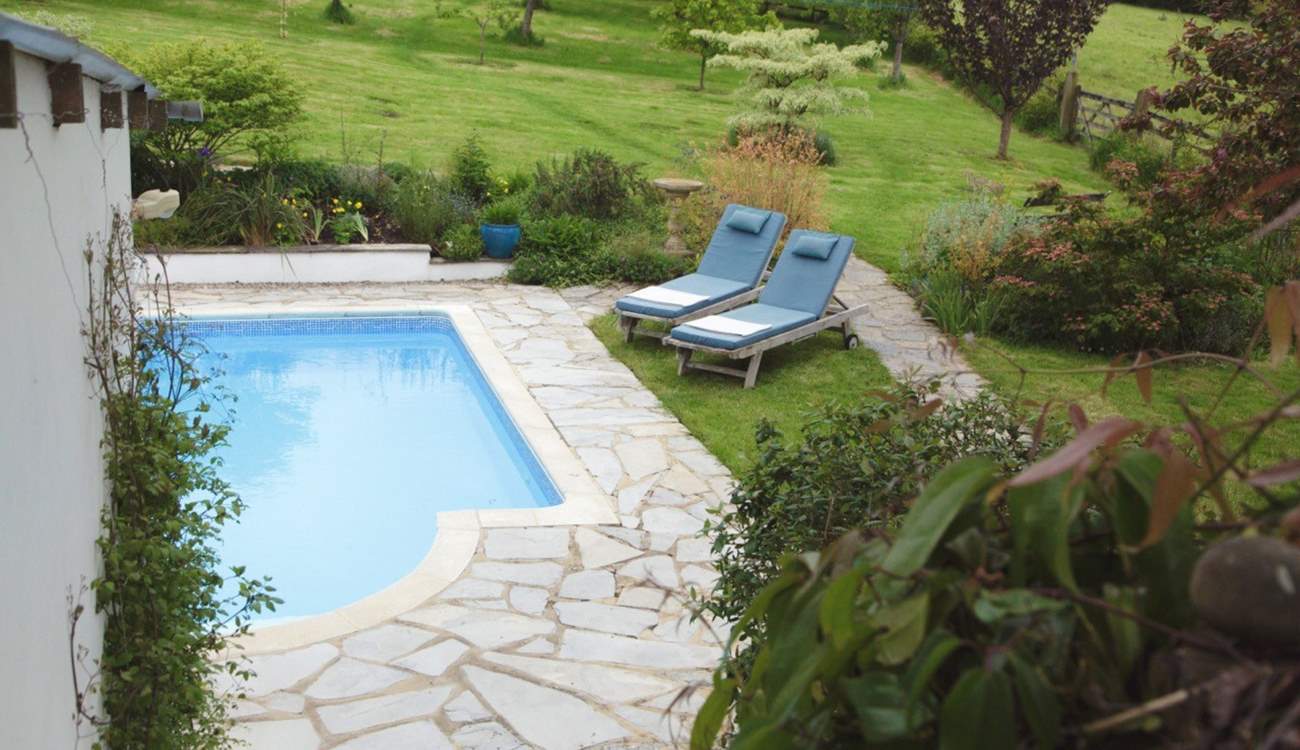 Looking down onto the pool area from your balcony.