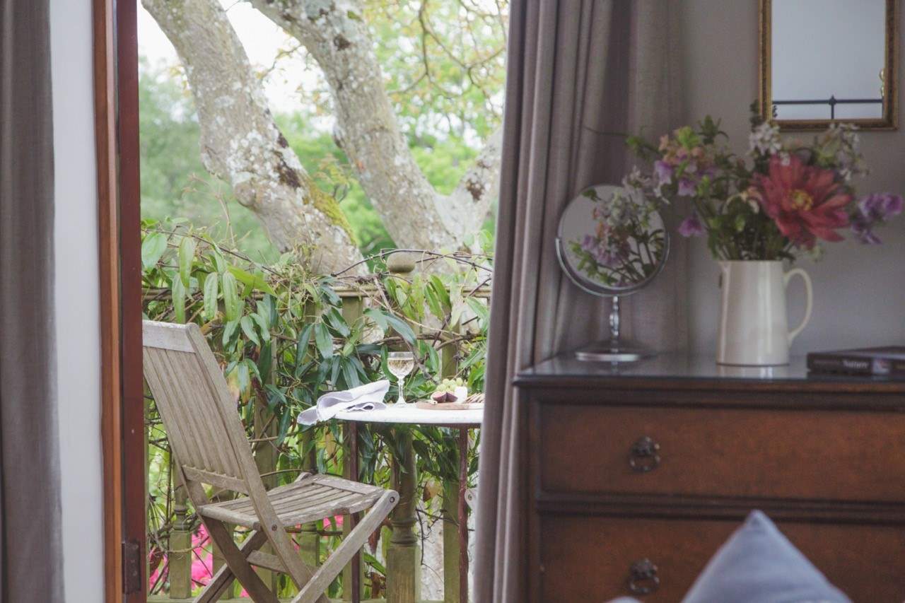 Step outside of the first floor sitting and bedroom area onto this delightful balcony space.