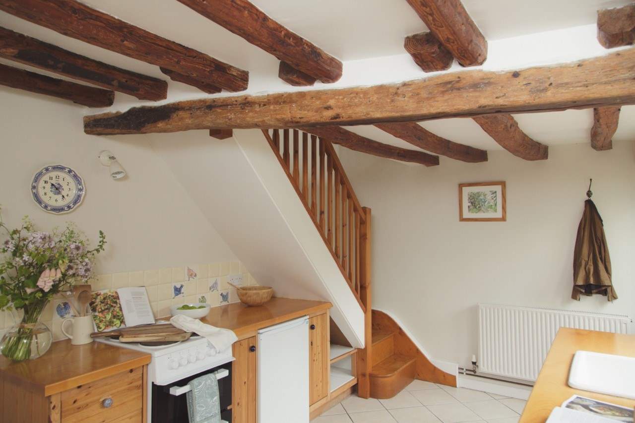 Head upstairs to the first floor sitting and sleeping area.