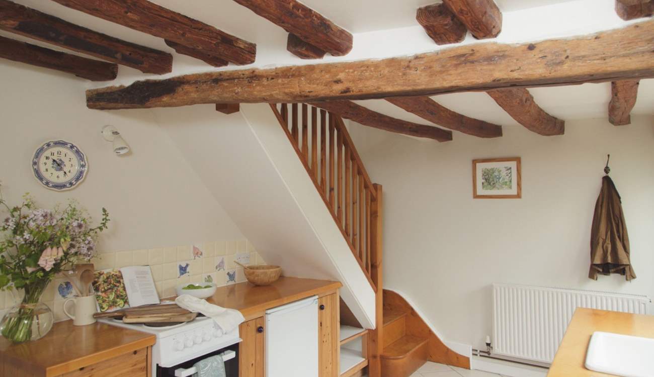 Head upstairs to the first floor sitting and sleeping area.