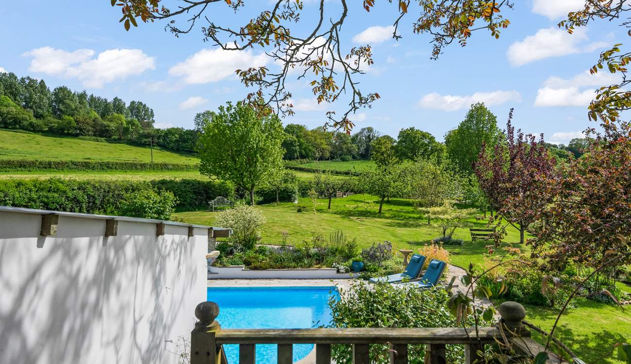 Looking down onto the pool area from your balcony.