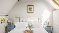 Retiring to bed is a treat in this super inviting king-size bed.