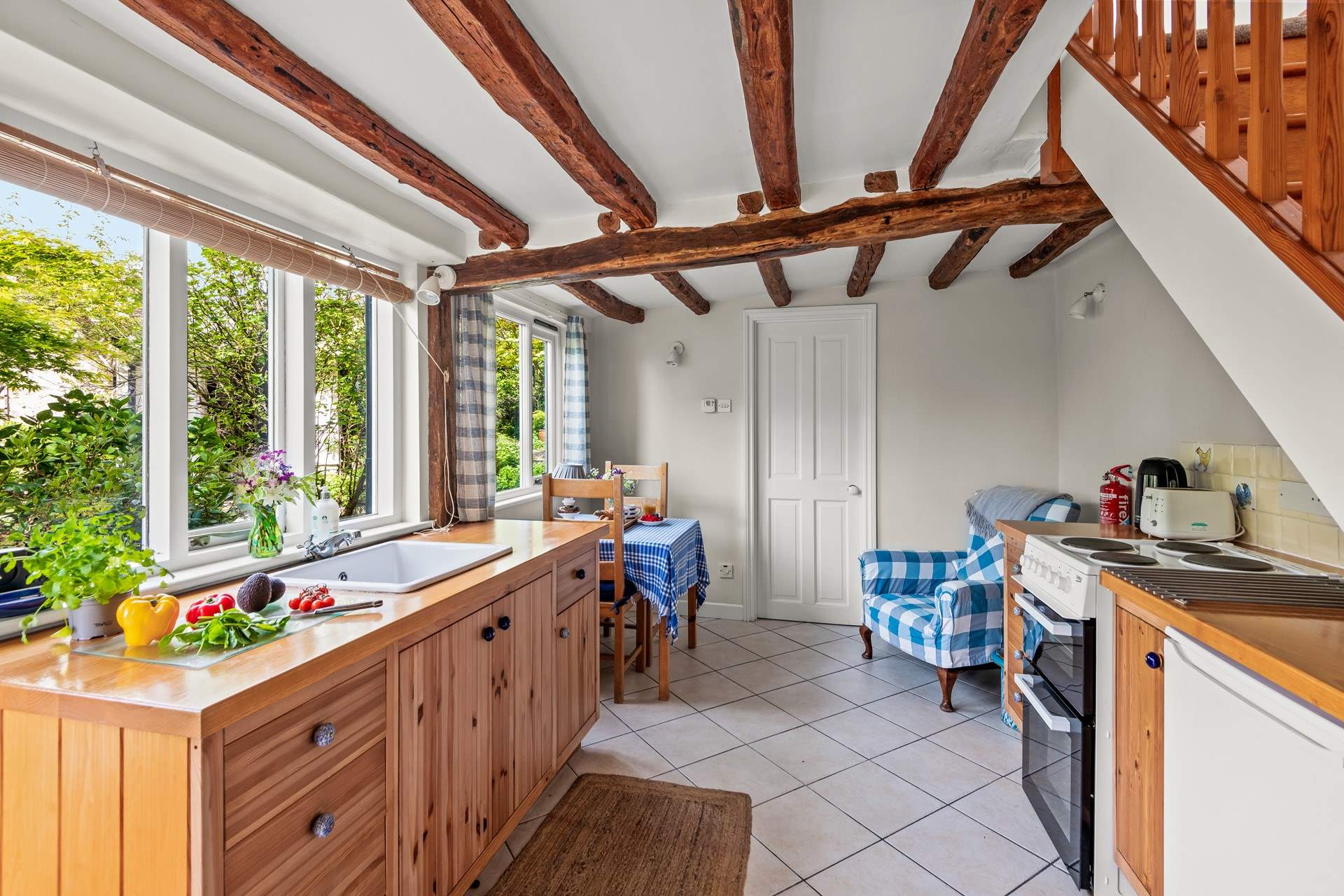 The kitchen is compact yet offers ample food preparation space.