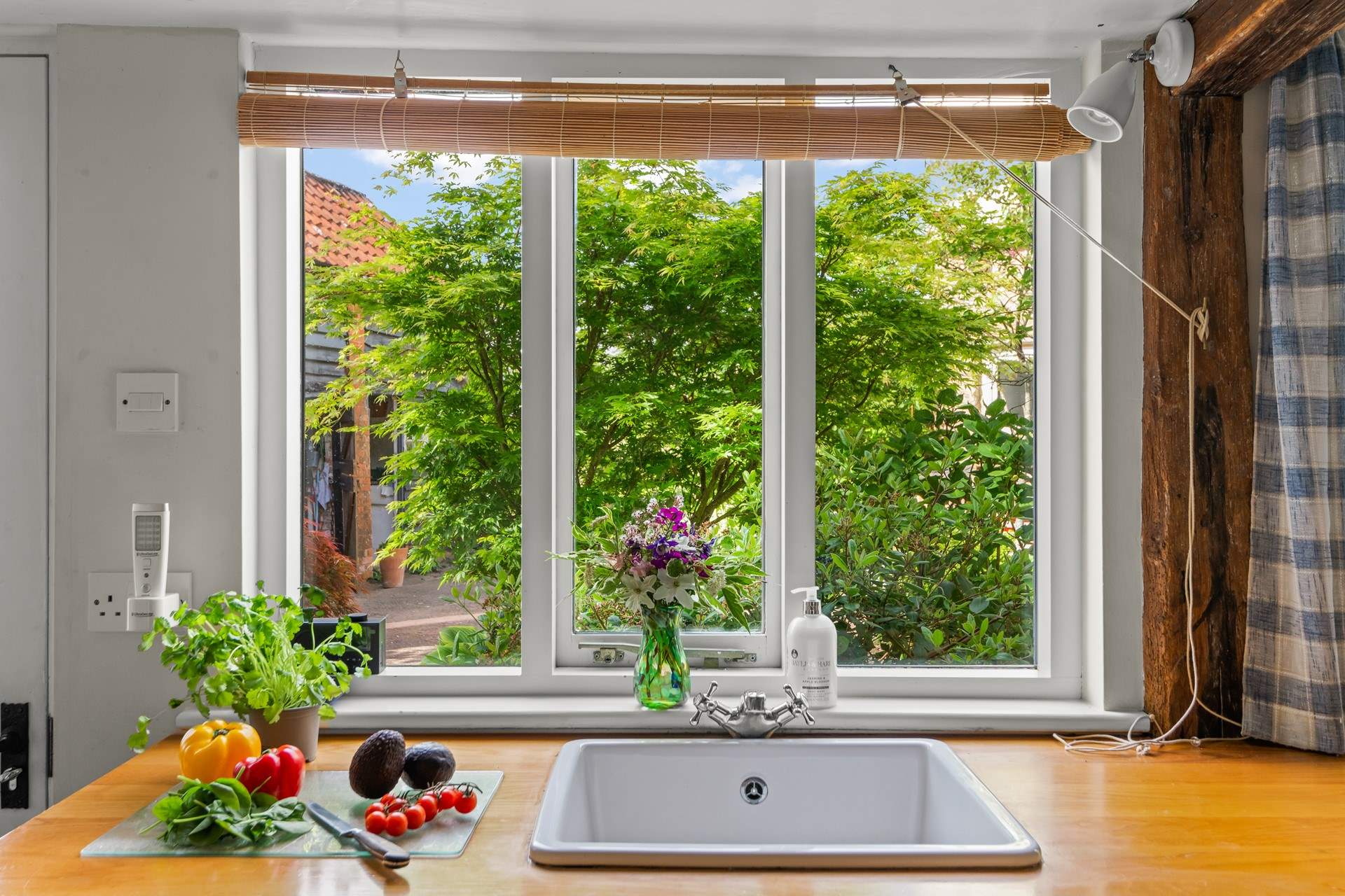 Even washing up is a treat with the beautiful shrubbery as a view.