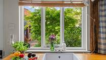 Even washing up is a treat with the beautiful shrubbery as a view.