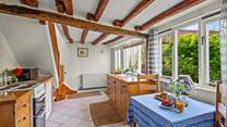 Step directly into the kitchen and dining-area.