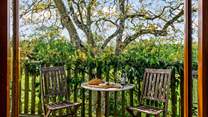 Step outside of the first floor sitting and bedroom area onto this delightful balcony space.