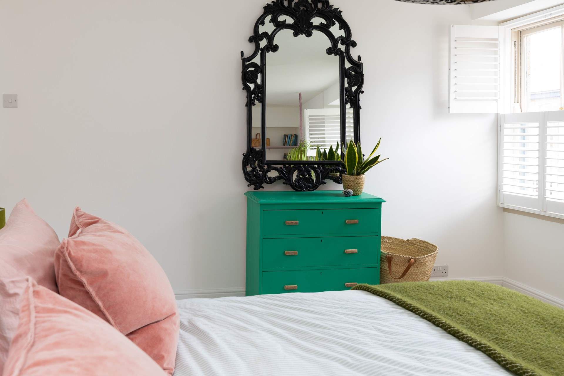 The main bedroom has eclectic decor. 