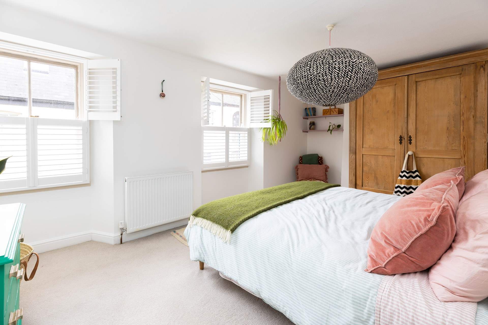 This bedroom is so light and airy. 