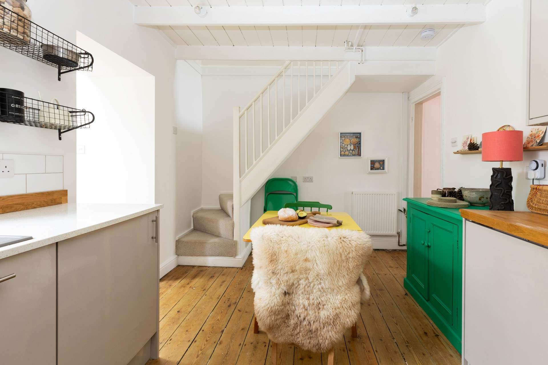 The kitchen/diner has great high ceilings (please take care on the stairs, there is a large bottom step and the rest are steep)