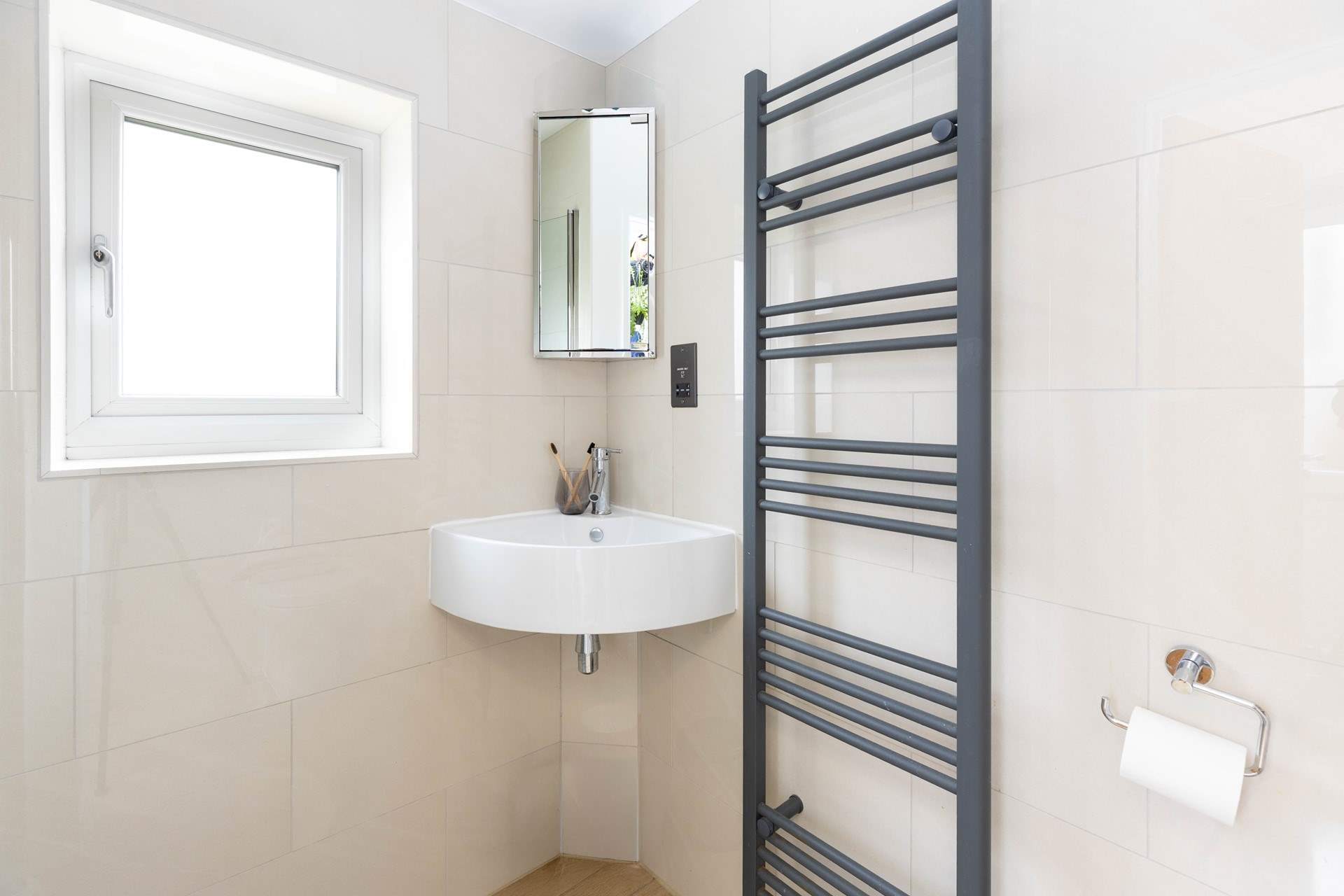 The wet-room has plenty of storage for all your toiletries. 