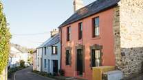 A warm welcome awaits in Ty Pinc, which nestles on a peaceful street, within a short walk of the Blue Flag beach at Poppit Sands. It's where the Pembrokeshire Coast Path begins. 
