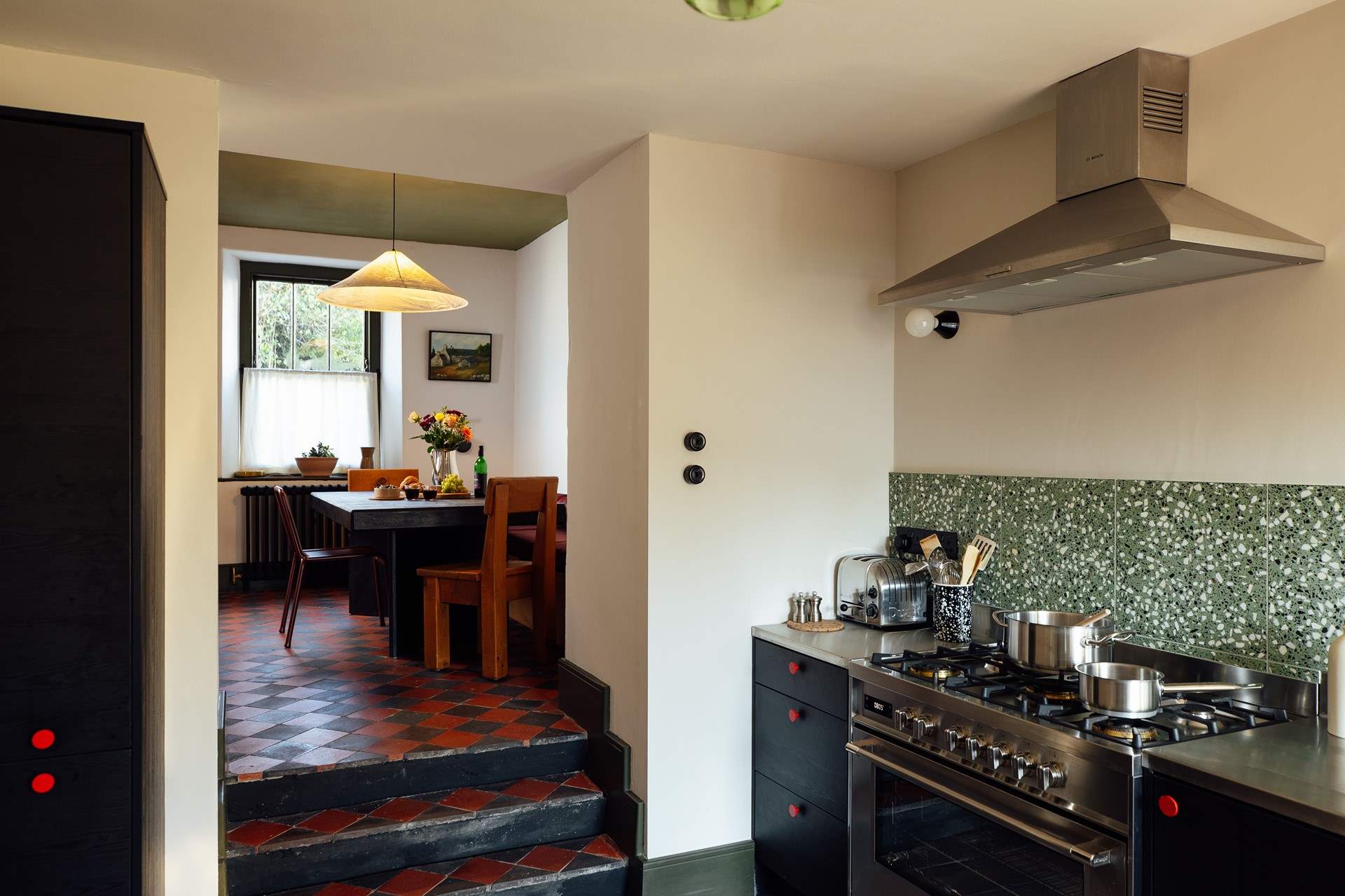 The open plan kitchen and dining-room are perfect for get togethers. 