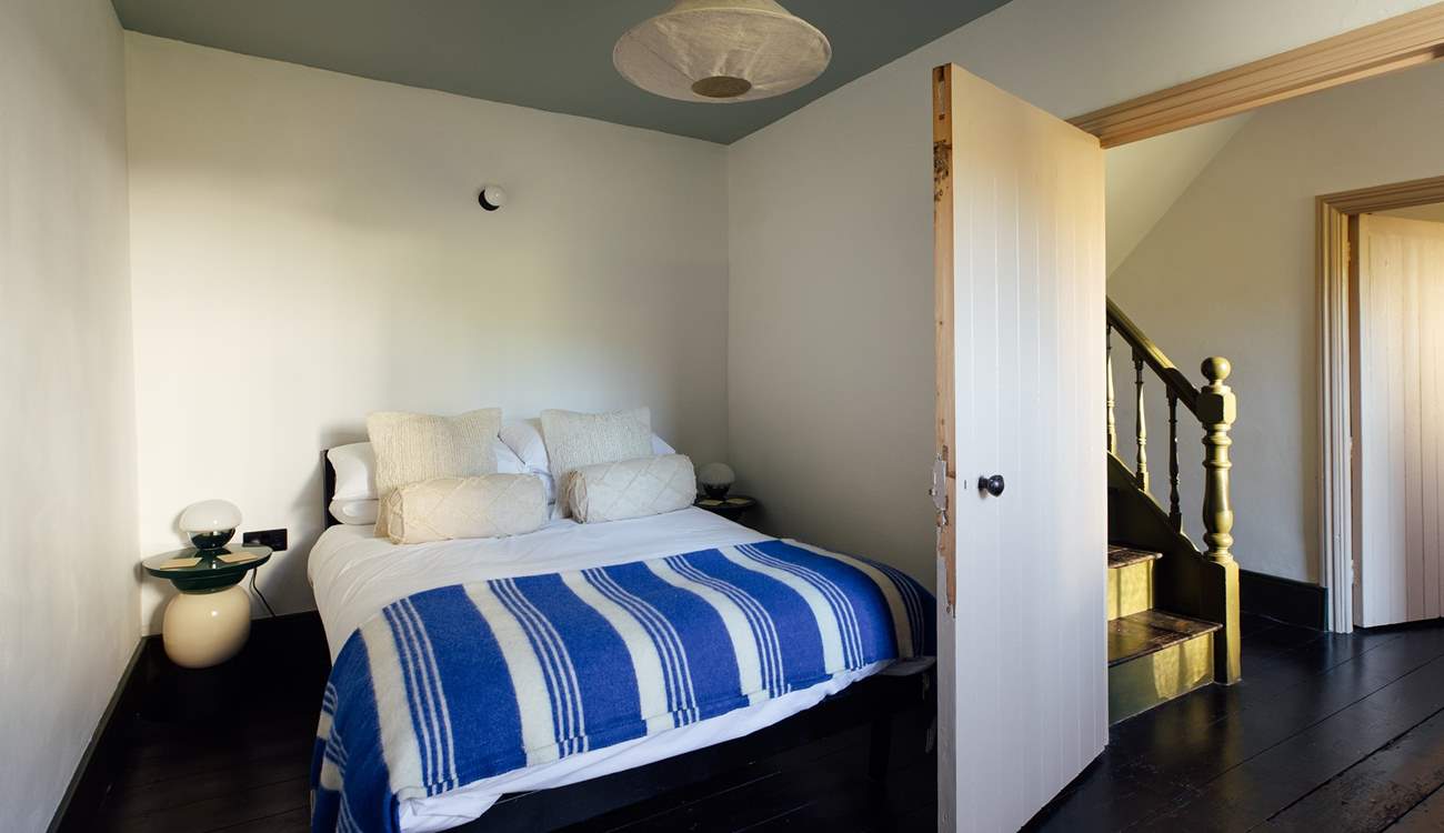 Front facing bedroom 2, located across the landing from bedroom 1. 
