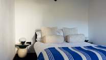 Enjoy comfortable beds and luxurious linens in Ty Pinc. 
