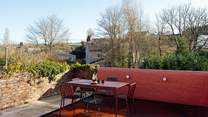 Enjoy breakfasts on the sunny patio above the garden, or end the day under the starry sky. 