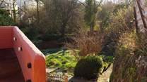 Children and dogs will love exploring the garden, accessed via steps from the patio.
