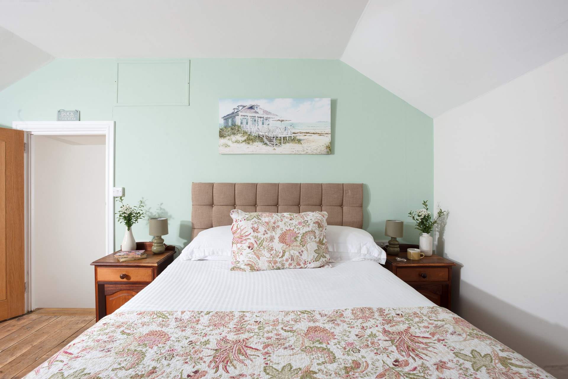 A king-size bed awaits.